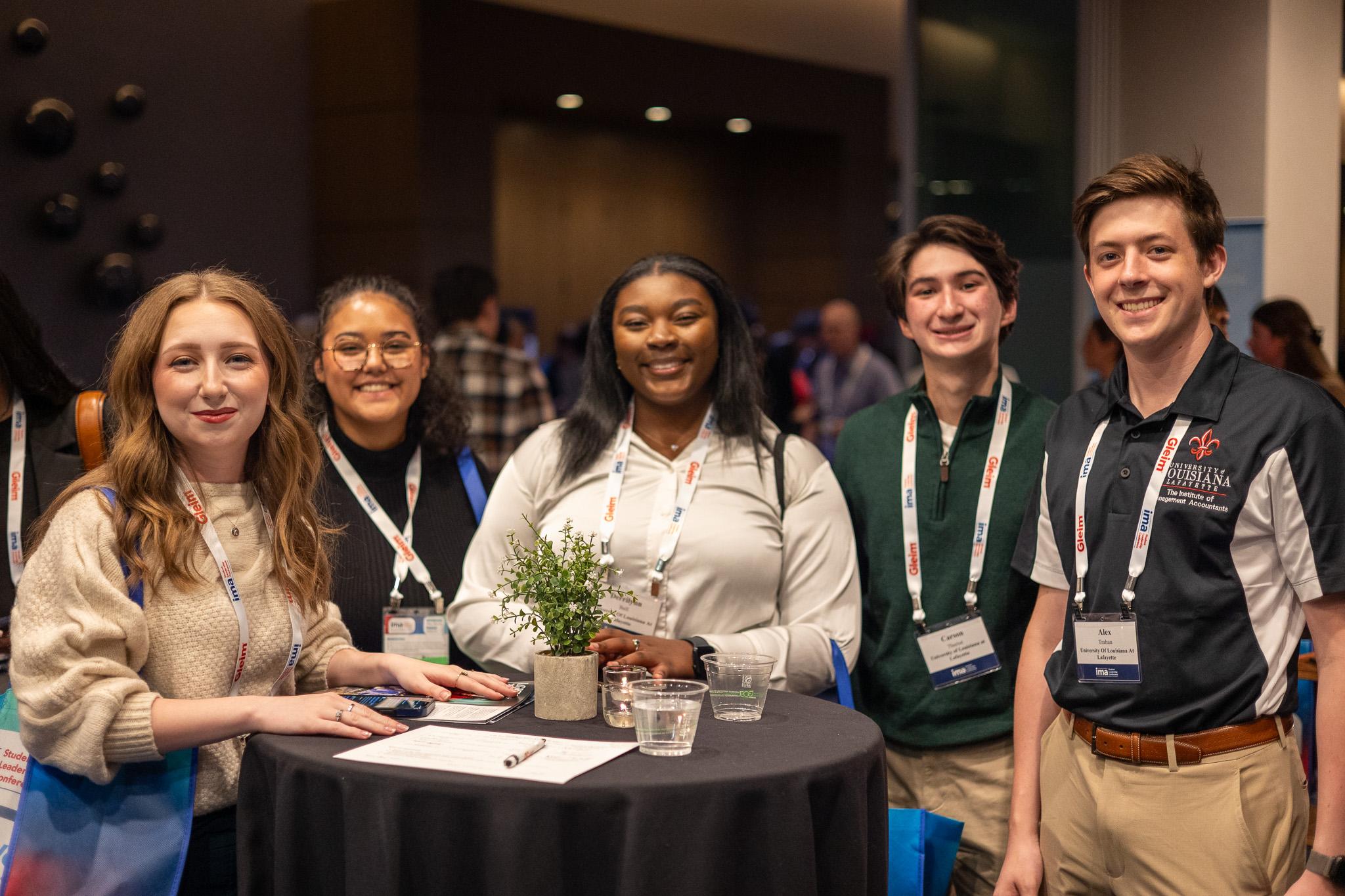 Five students at conference